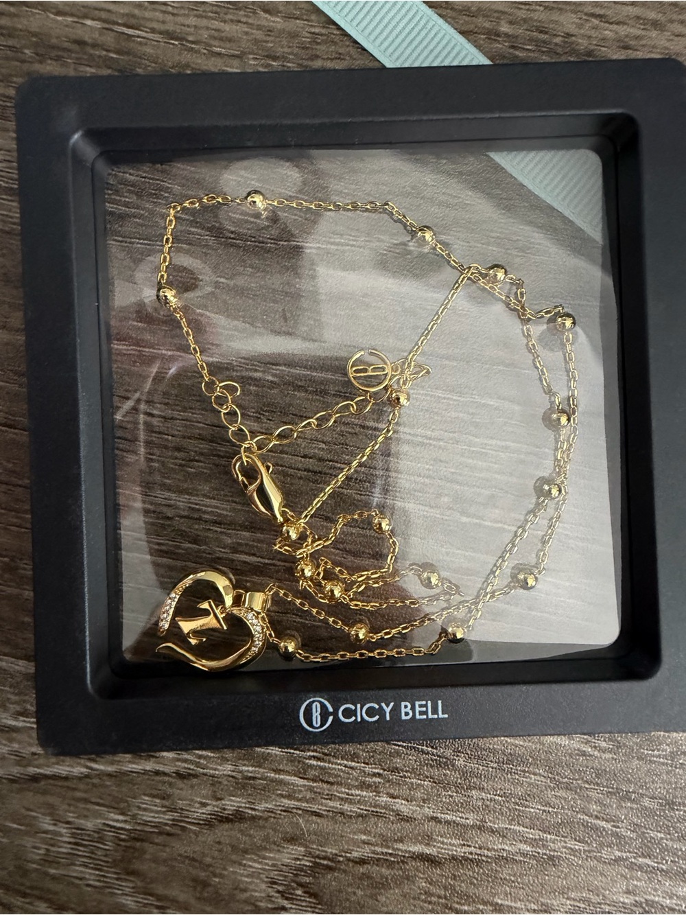 Gold Heart Pendant Necklace with letter “Z”